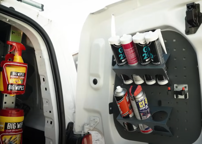 Van door storage - tubes inside perfo storage holders